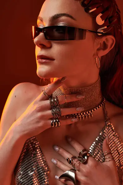A beautiful woman showcases exquisite elegance in a unique fashion style adorned with accessories. — Stock Photo