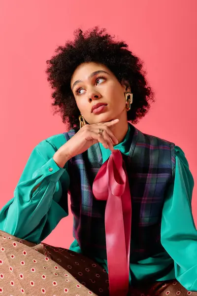 Young woman with a stylish outfit and unique accessories gracefully gazes to the side. — Stock Photo