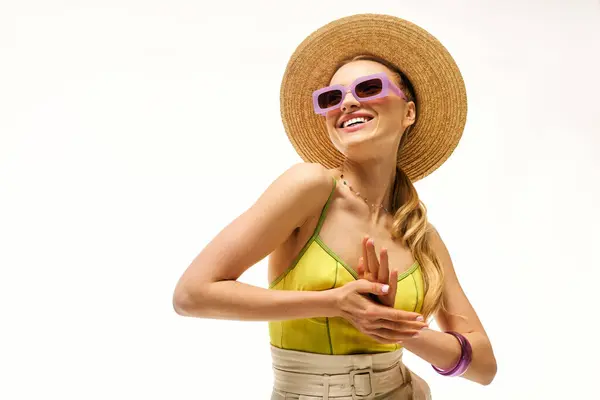 Charming woman dressed in vibrant outfit dances cheerfully under warm sunlight, radiating joy. — Stock Photo