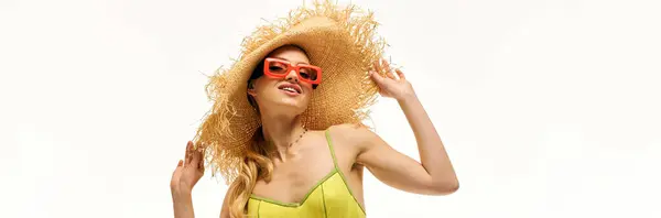 A beautiful young woman twirls playfully in a bright outfit, basking in the summer sun. — Stock Photo