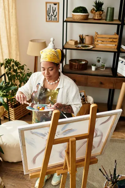 A beautiful woman skillfully engages in crafting while surrounded by natural light and plants. — Stock Photo