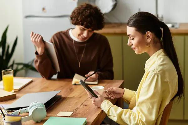 The caring couple shares a cozy moment, engaged in their tasks, filled with love and creativity. — Stock Photo