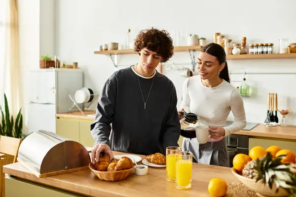 A loving couple enjoys a delightful breakfast together, surrounded by homey comforts and smiles. — Stock Photo