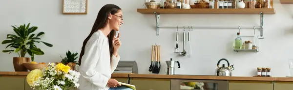 Young woman with glasses embraces the comfort of home in a peaceful and inviting atmosphere. — Stock Photo