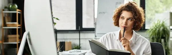 A young businesswoman with curly hair thoughtfully considers her notes at work during summer, banner — Stock Photo