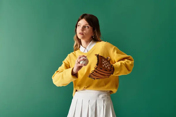 Energetic young woman exudes summer vibes while holding a baseball glove and ball, ready to play. — Stock Photo
