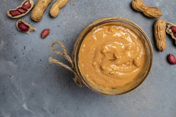 peanut butter and peanut beans. banner, menu, recipe place for text, top view.