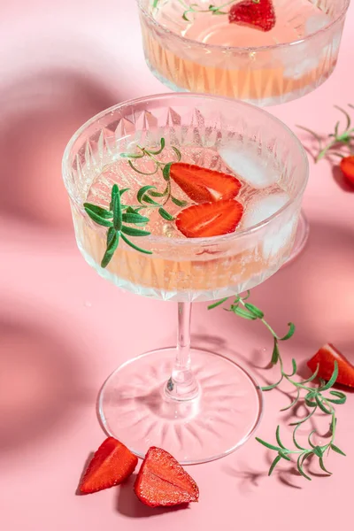 Refreshing Fruit Cocktail Punch Wine Champagne Strawberries Ice Rosemary Pink — Stockfoto