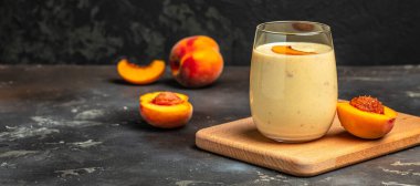 protein shake with peach milkshake, yogurt peaches breakfast drink, Long banner format,