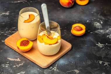 Peach drink in a glass with milk on a light background, Healthy eating. Breakfast, snack, Restaurant menu, dieting, cookbook recipe top view,