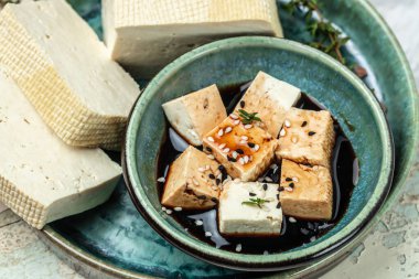 japanese tofu cheese whole piece with soy sauce topping, Food recipe background. Close up,