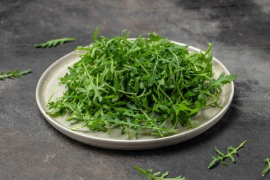 Sağlıklı salata, yapraklı roka. Yemek tarifi geçmişi. Kapat..