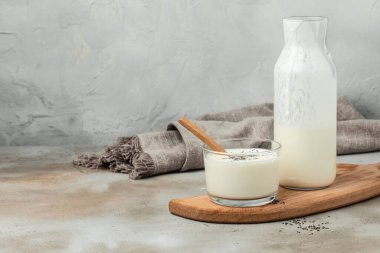 A bottle of milk and glass of yogurt, kefir, fermented milk, Probiotic cold fermented dairy drink. top view,