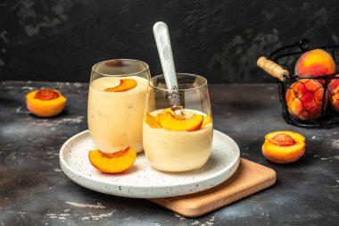 peach, milk yogurt. Healthy eating. Breakfast, snack Restaurant menu, dieting cookbook recipe top view.