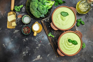 delicious broccoli soup with basil and cream, Diet detox food concept, top view. place for text.