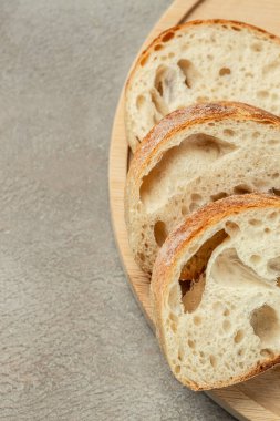 ciabatta bread. Sliced baked baguette. vertical image. top view. place for text.
