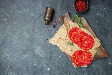 chorizo sausage slices or salami pepperoni, traditional spanish tapas, banner, menu, recipe place for text, top view.