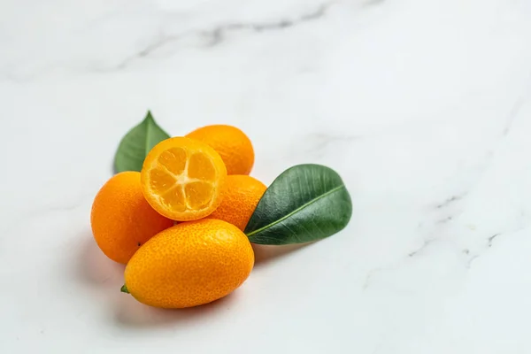 kumquat fruit, chinese tangerine. banner, menu, recipe place for text top view
