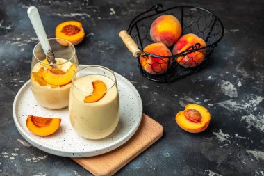 peach, milk yogurt. Healthy eating. Breakfast, snack Restaurant menu, dieting cookbook recipe top view.