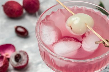 Fresh juicy lychee fruit on a glass. tropical fruit summer in Thailand. place for text, top view.