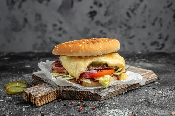 cheeseburger. melted cheese burger. Fast food take away. copy space.