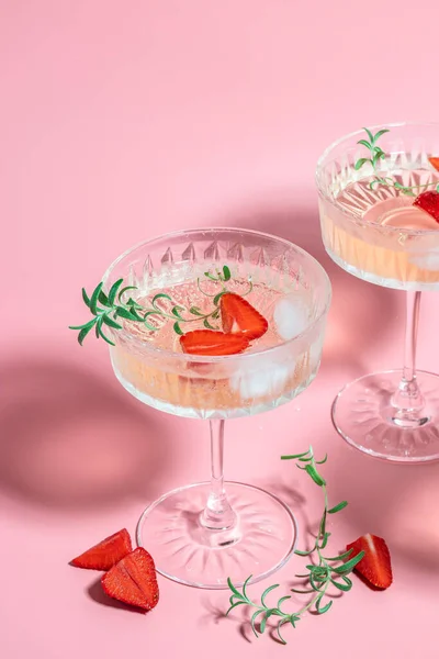 Refreshing Fruit Cocktail Punch Wine Champagne Strawberries Ice Rosemary Pink — Stockfoto