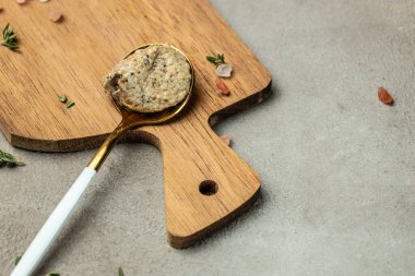 mushrooms sauce, truffle paste on a wooden board. Clean eating, dieting, vegan food concept. top view.