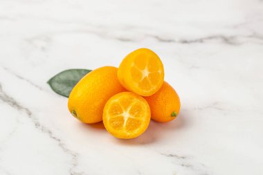 Fresh ripe kumquat fruit, chinese tangerine. banner, menu, recipe place for text, top view