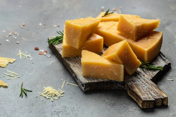 Sliced Grated Parmesan Cheese Rosemary Gray Table Banner Menu Recipe — Foto de Stock