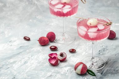 Organic leechee sweet fruit with litchy juice in glass. Restaurant menu, dieting, cookbook recipe top view,