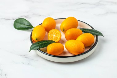 kumquat fruit, chinese tangerine. banner, menu, recipe place for text top view