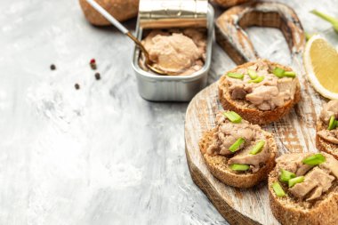 open sandwiches with cod liver and green onion, Natural source of omega 3. banner, menu, recipe place for text, top view,