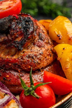 Baked pork leg with potatoes, Food recipe background. Close up,