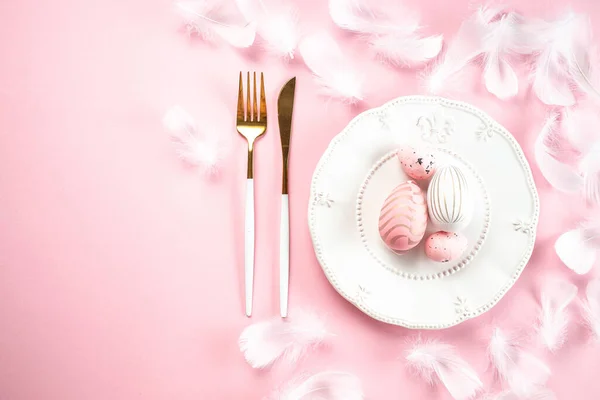 stock image Colorful easter eggs and white plate on pink background. Happy Easter holiday concept.