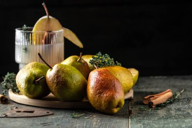 ripe organic pears on a wooden background. banner, menu, recipe place for text, close-up.