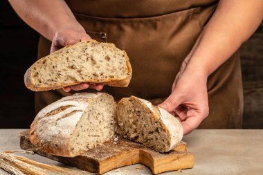 Fresh homemade crisp bread on a wooden board. kitchen or bakery. banner, menu, recipe place for text, top view.