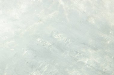 Eski gri beton duvarın dokusu. Doğal çimento veya taş eski malzeme dokusunun klasik beyaz arka planı, metin için yer, üst görünüm,