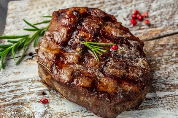 Grilled beef tenderloin steak. Restaurant menu, dieting, cookbook recipe top view.