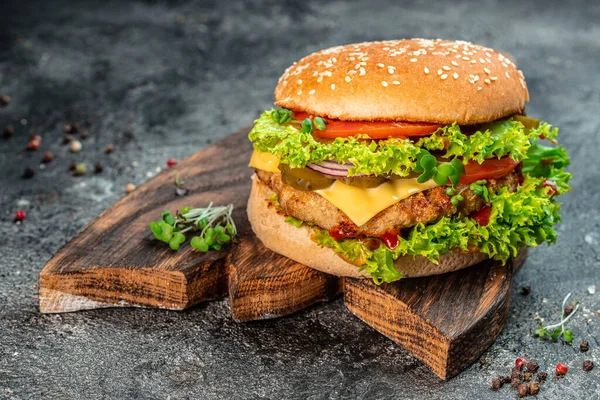 stock image Fast food Burger with beef, tomato, cheese, and lettuce. junk food concept.