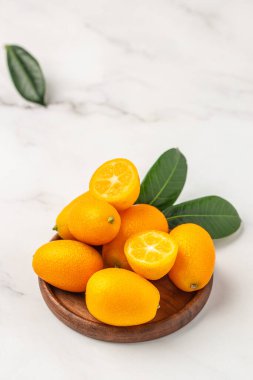 kumquat fruit, chinese tangerine. banner, menu, recipe place for text top view