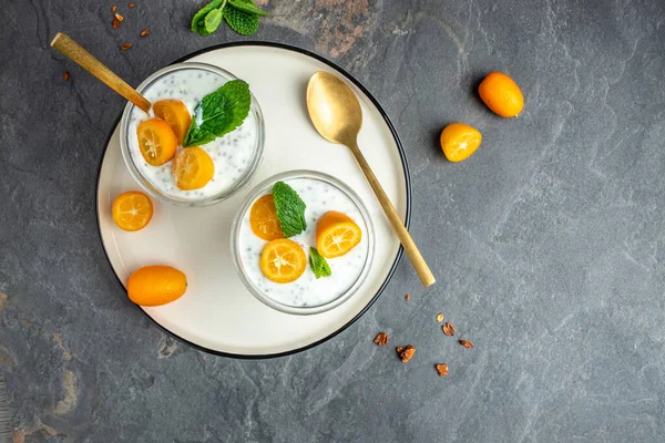 Kumquat chia pudding yogurt. healthy breakfast. superfood concept. Healthy, clean eating. Vegan or gluten free diet.