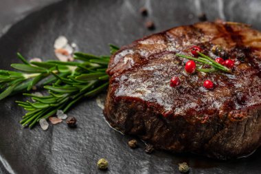 Grilled beef tenderloin steak. Restaurant menu, dieting, cookbook recipe top view. clipart