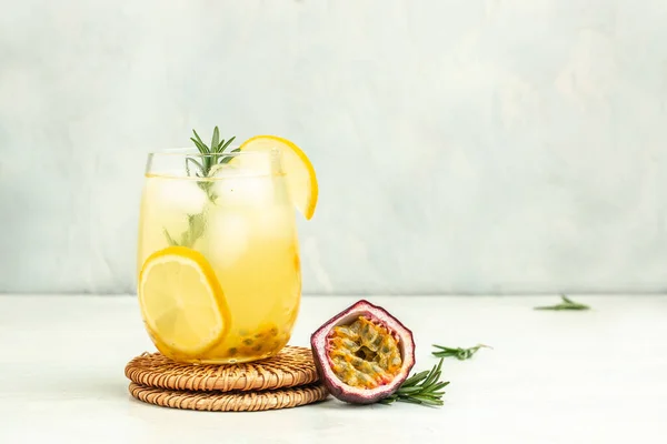 passion fruit drink, Tropical drink for summer party. on a light background, refreshing drink or beverage with ice, place for text,