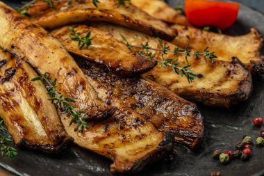 king oyster mushrooms, Pleurotus eryngii grilled with spices and herbs. Healthy vegan food concept, banner, menu, recipe place for text, top view,