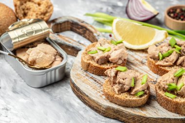 Cod liver fresh seafood healthy meal food. Sandwich with cod liver on rye bread. Health care concept. Natural source of omega 3.