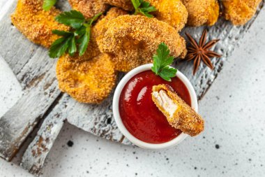 Ketçaplı çıtır tavuk nugget. Yemek tarifi geçmişi. Kapat..