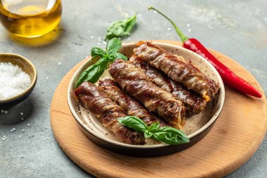 Doldurulmuş domuz pastırması. Domuz pastırmalı kıyma. Yemek tarifi geçmişi. Kapat..