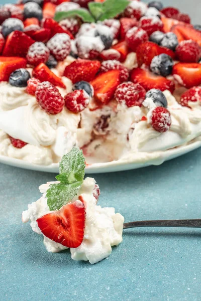 delicious meringue cake Pavlova with fresh straberry, vertical image. top view. place for text,