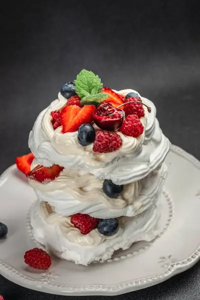 Pavlova cake with whipped mascarpone cream and fresh strawberry, Restaurant menu, dieting, cookbook recipe top view,