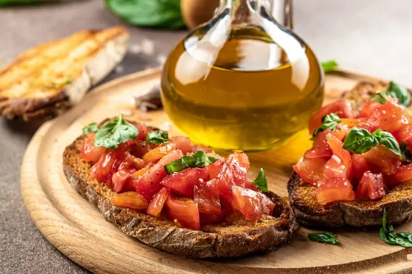 Spanish breakfast with toast of bread with oil and tomato. banner, menu, recipe place for text, top view.